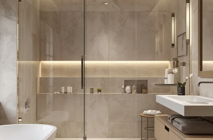 Luxurious modern walk-in shower with frameless glass, large-format tiles, rainfall showerhead, and spa-inspired bathroom design