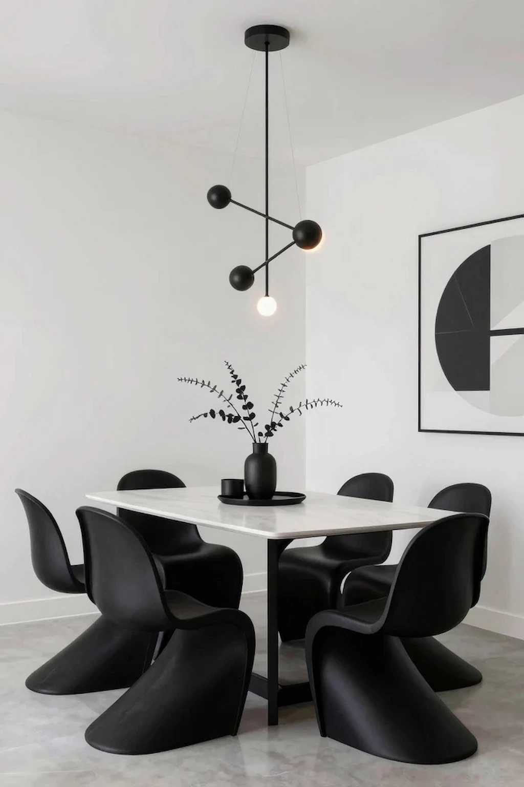 Stylish dining room featuring a black and white modern color scheme